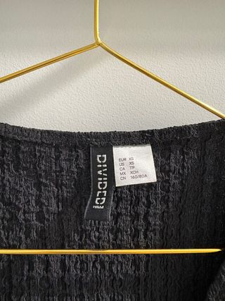 Blusa H&M negra con lazos delanteros - Talla XS