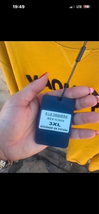 Sudadera amarilla con logo VAQUERA