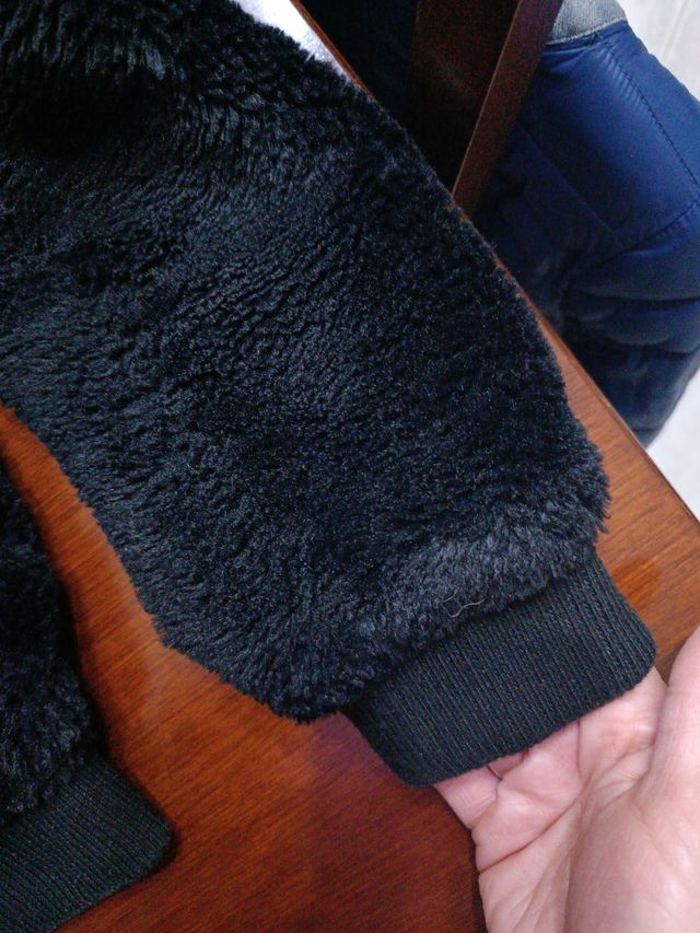 Giacca pelliccia sintetica nera con cappuccio