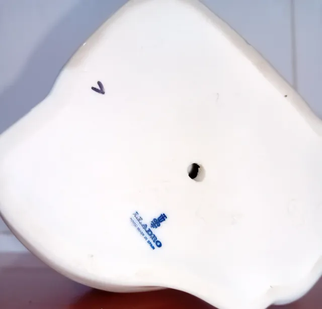 Figura Lladró Ángel y Bebé en Cuna