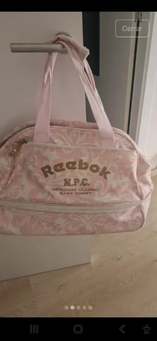 Bolsa deportiva Reebok rosa y blanca