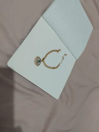 Pulsera con ojo azul y dorado