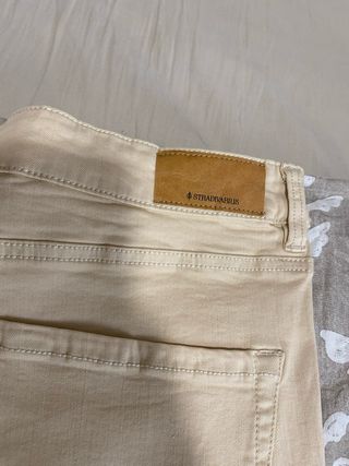 Pantalón flare beige Stradivarius