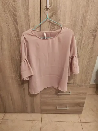 Blusa rosa nueva.