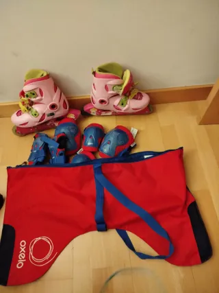 Patines Oxelo talla 32 a 34rosas con protecciones