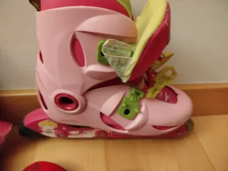 Patines Oxelo talla 32 a 34rosas con protecciones
