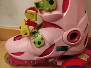 Patines Oxelo talla 32 a 34rosas con protecciones