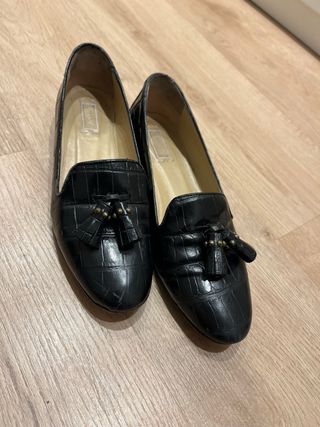 Zapatos planos  negros con flecos