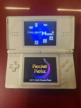Nintendo DS Lite Blanca con cargador y juegos
