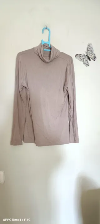 Jersey cuello alto beige