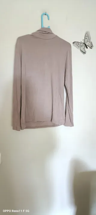 Jersey cuello alto beige