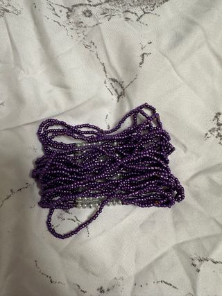 Pulsera elástica morada y plateada