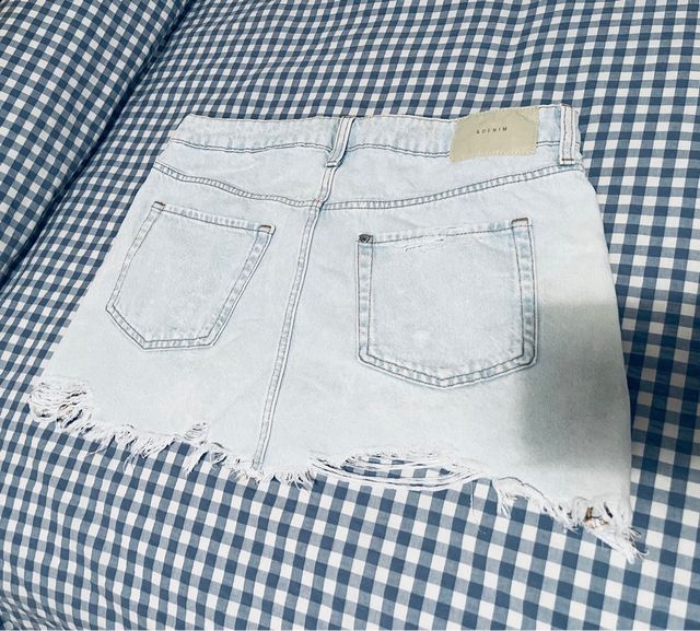 Falda vaquera mini efecto roto