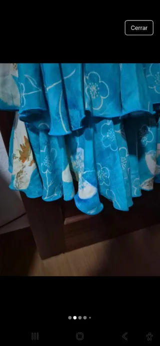 Traje de flamenca azul con volantes