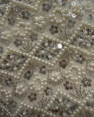 Chaqueta perlas y lentejuelas