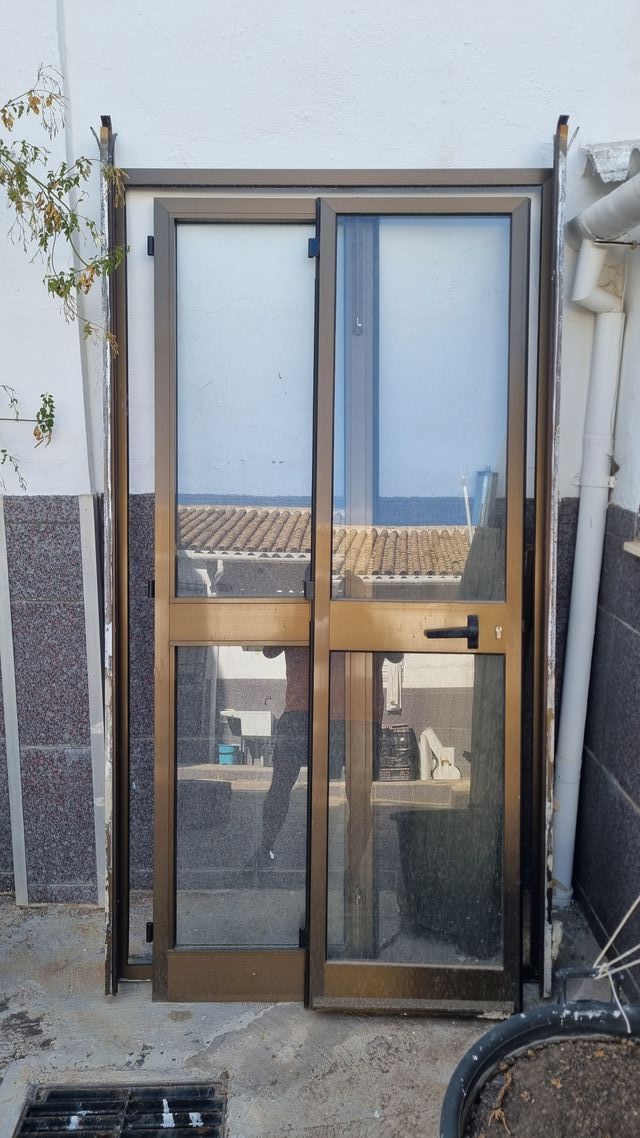 Puerta doble hoja aluminio