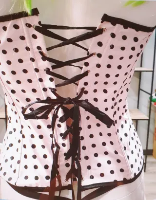 CORPIÑO ROSA CON TOPOS BLANCOS