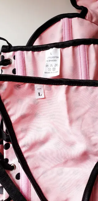 CORPIÑO ROSA CON TOPOS BLANCOS