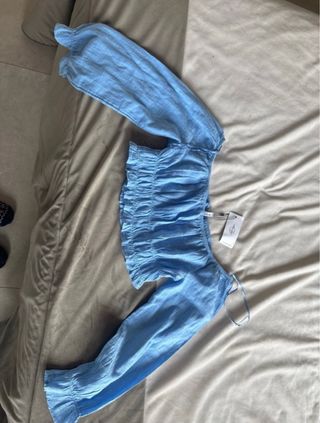 Blusa azul manga larga fruncida