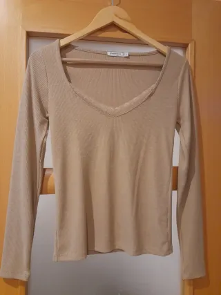 Jersey Stradivarius pico beige talla S
