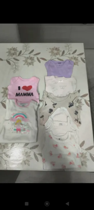 Set 7 body bimba 6/9 mesi 68 cm