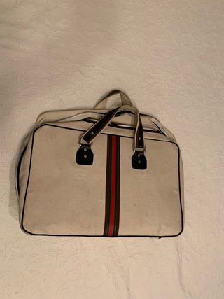 Maleta vintage de loneta con detalles en cuero