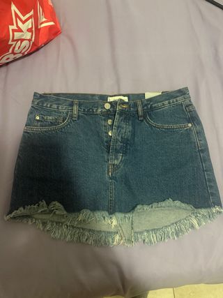 Minifalda vaquera con flecos