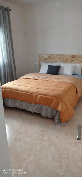 Ático con terraza en calle ancha