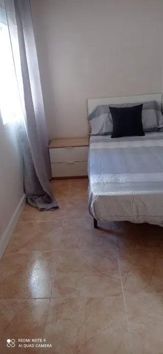 Ático con terraza en calle ancha