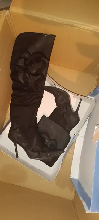 Botas altas de tacón 