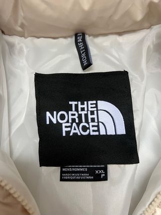 The North Face Chaqueta Puffer Beige y Blanca
