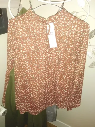 Blusa estampada manga larga