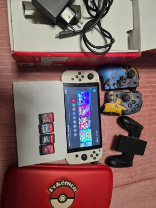 Nintendo Switch OLED con mandos y juegos