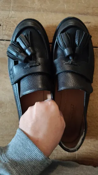 Mocassini Pomme d'Or neri con nappine