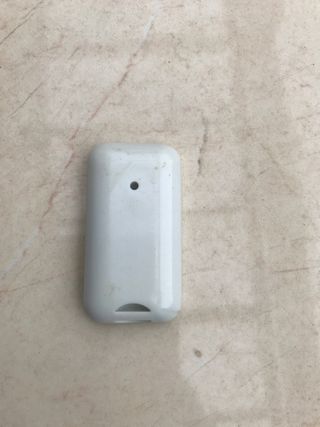 Mando de garaje azul y blanco