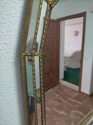 Espejo decorativo dorado y transparente