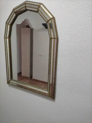 Espejo decorativo dorado y transparente