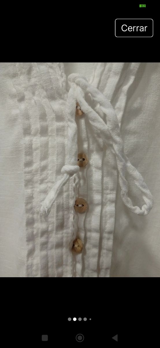 Zara. Abotonada en madera. Lino