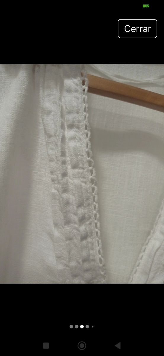 Zara. Abotonada en madera. Lino