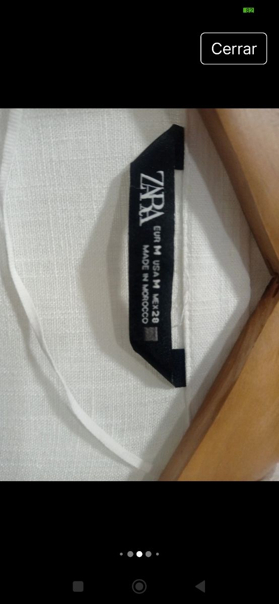 Zara. Abotonada en madera. Lino
