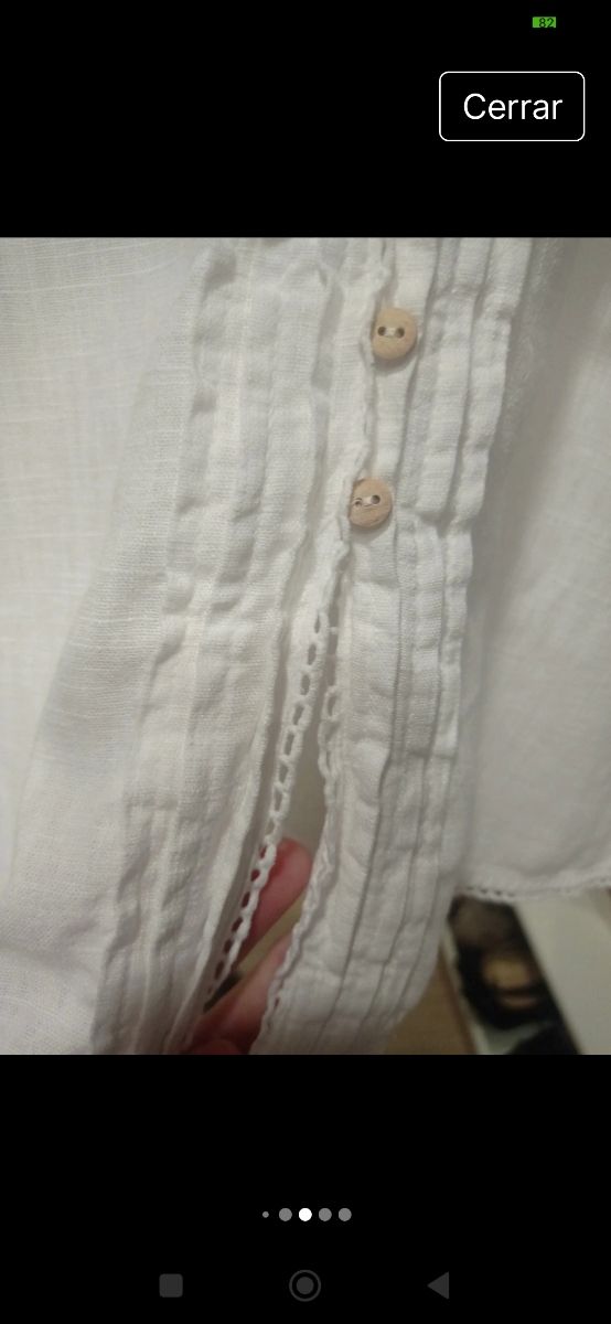 Zara. Abotonada en madera. Lino