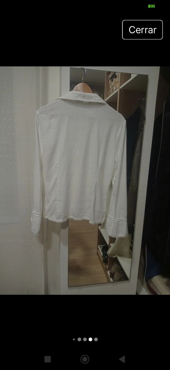 Zara. Abotonada en madera. Lino