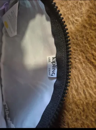 Lote bolso , cartera y neceser Kipling Multicolor