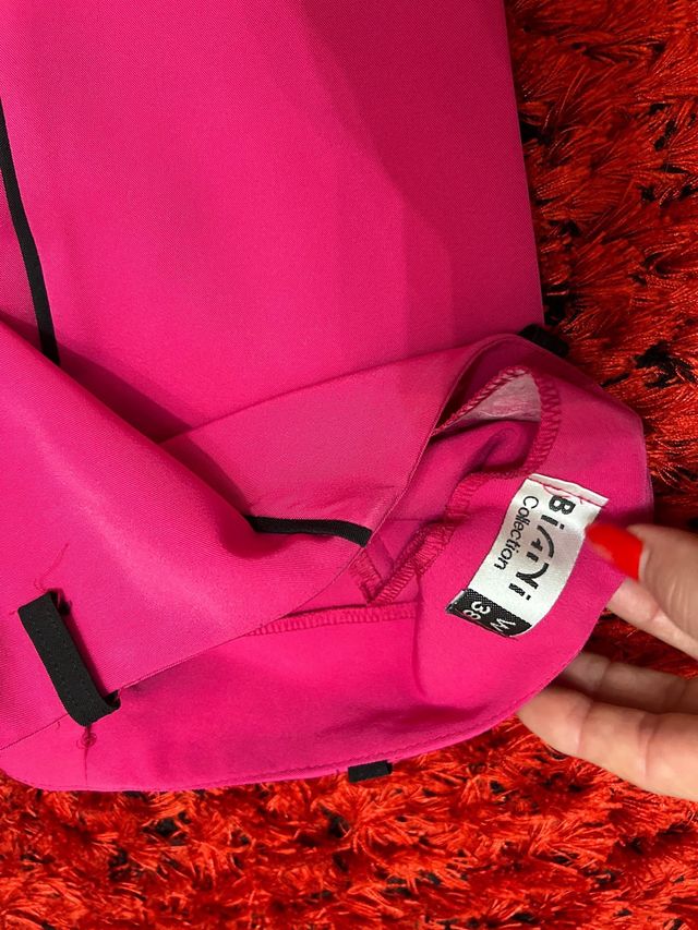Pantalón rosa flare con raya diplomática