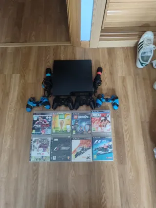 Consola PS3 Slim Negra + 8 Juegos