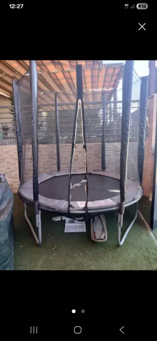 Cama elástica con red de seguridad