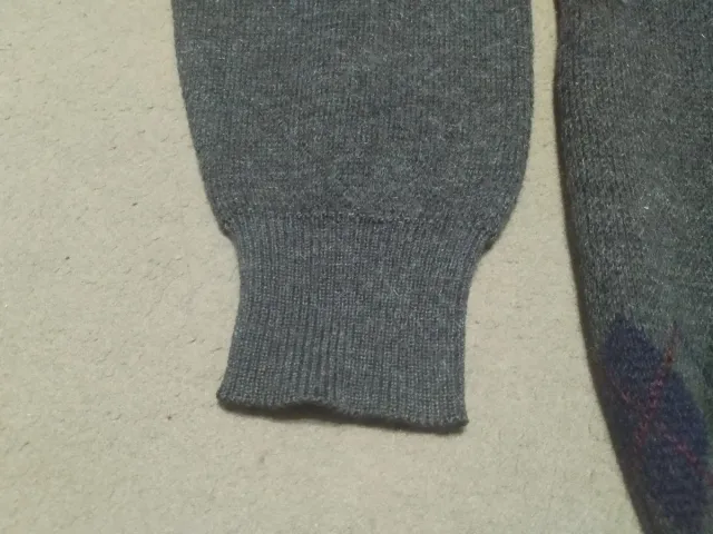 Jersey de lana gris con rombos