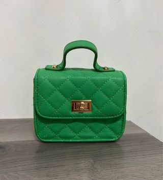 Borsa verde trapuntata con manico