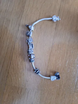 Pulsera Pandora con charms plata