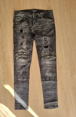 Pantalón vaquero hombre desgastado con cremalleras